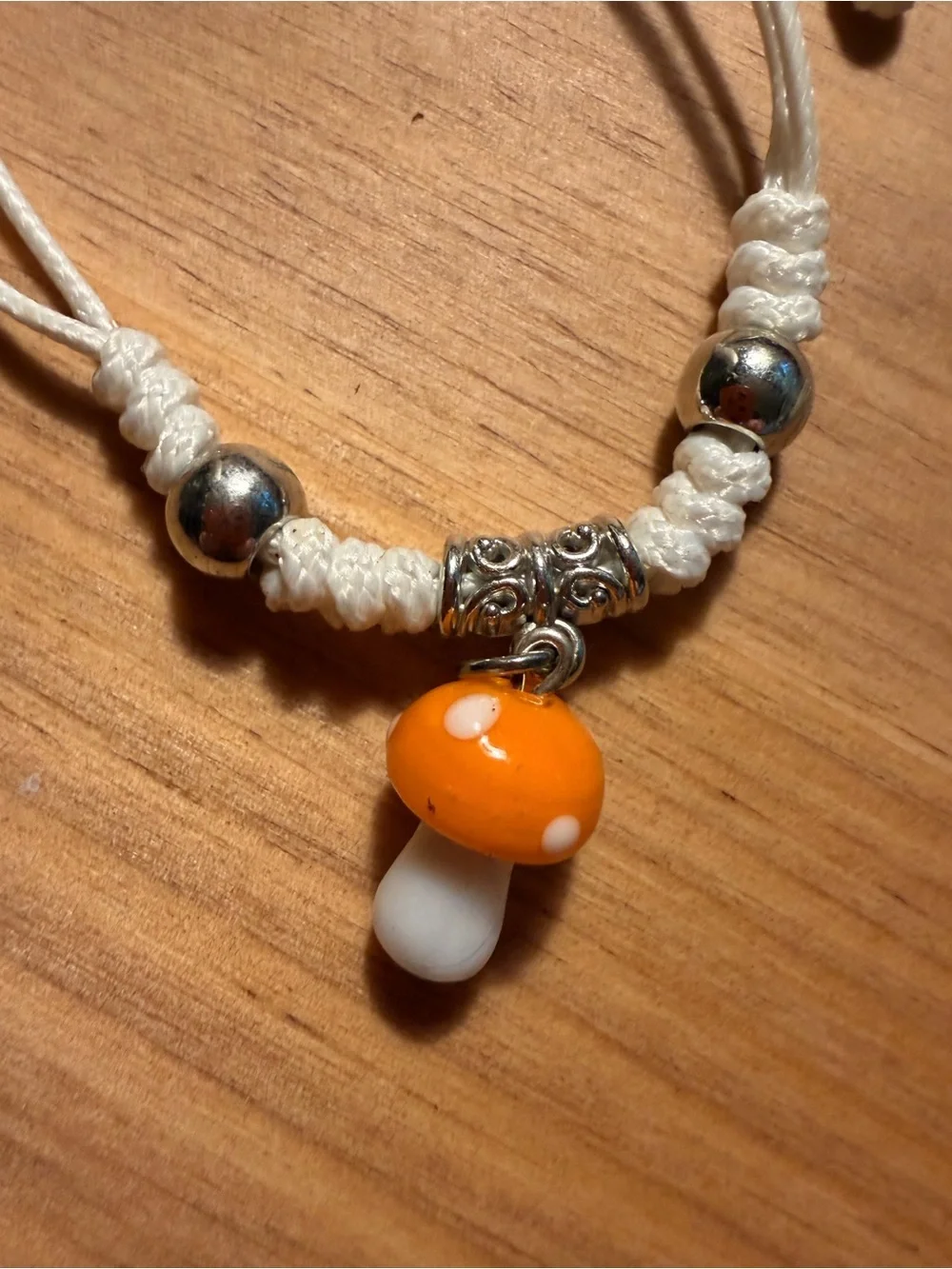 White Cord Bracelet with Orange Mushroom Charm